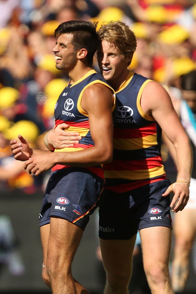 AFL 2016 Rd 02 - Adelaide v Port Adelaide ADELAIDE, AUSTRALIA - APRIL 2: Wayne Milera of the Crows celebrates his first goal with Rory Sloane during the 2016 AFL Round 02 match between the Adelaide Crows and Port Adelaide Power at the Adelaide Oval, Adelaide on April 2, 2016. (Photo by James Elsby/AFL Media)